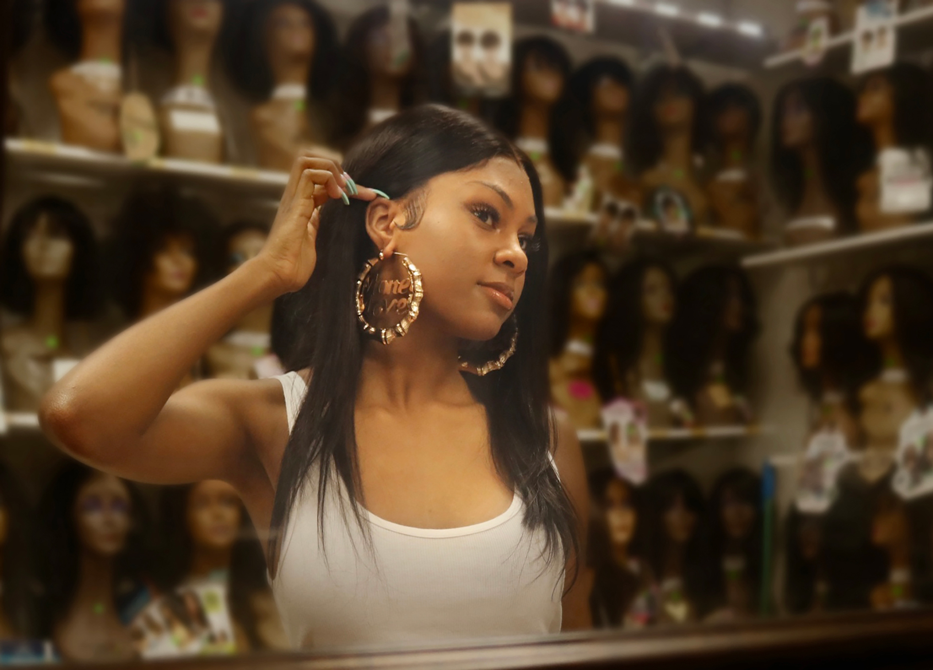 Photo of a girl wearing large hoop earrings