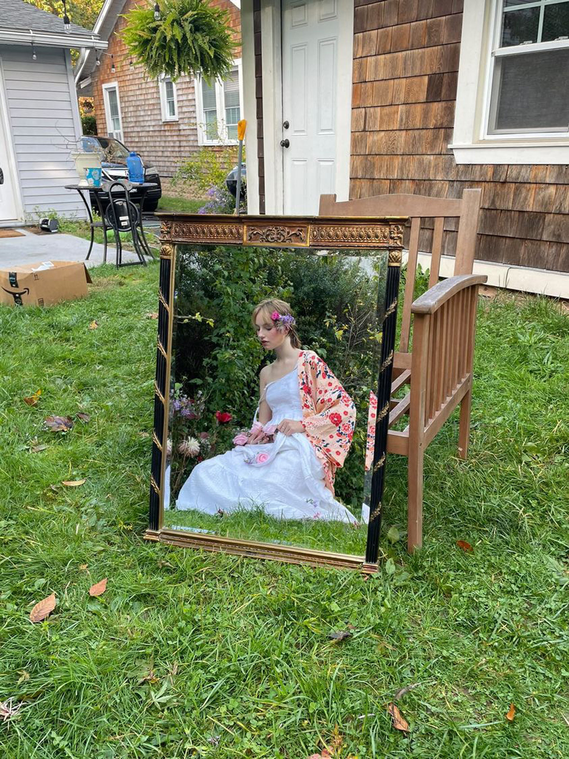 Photo of a mirror leaning against a chair