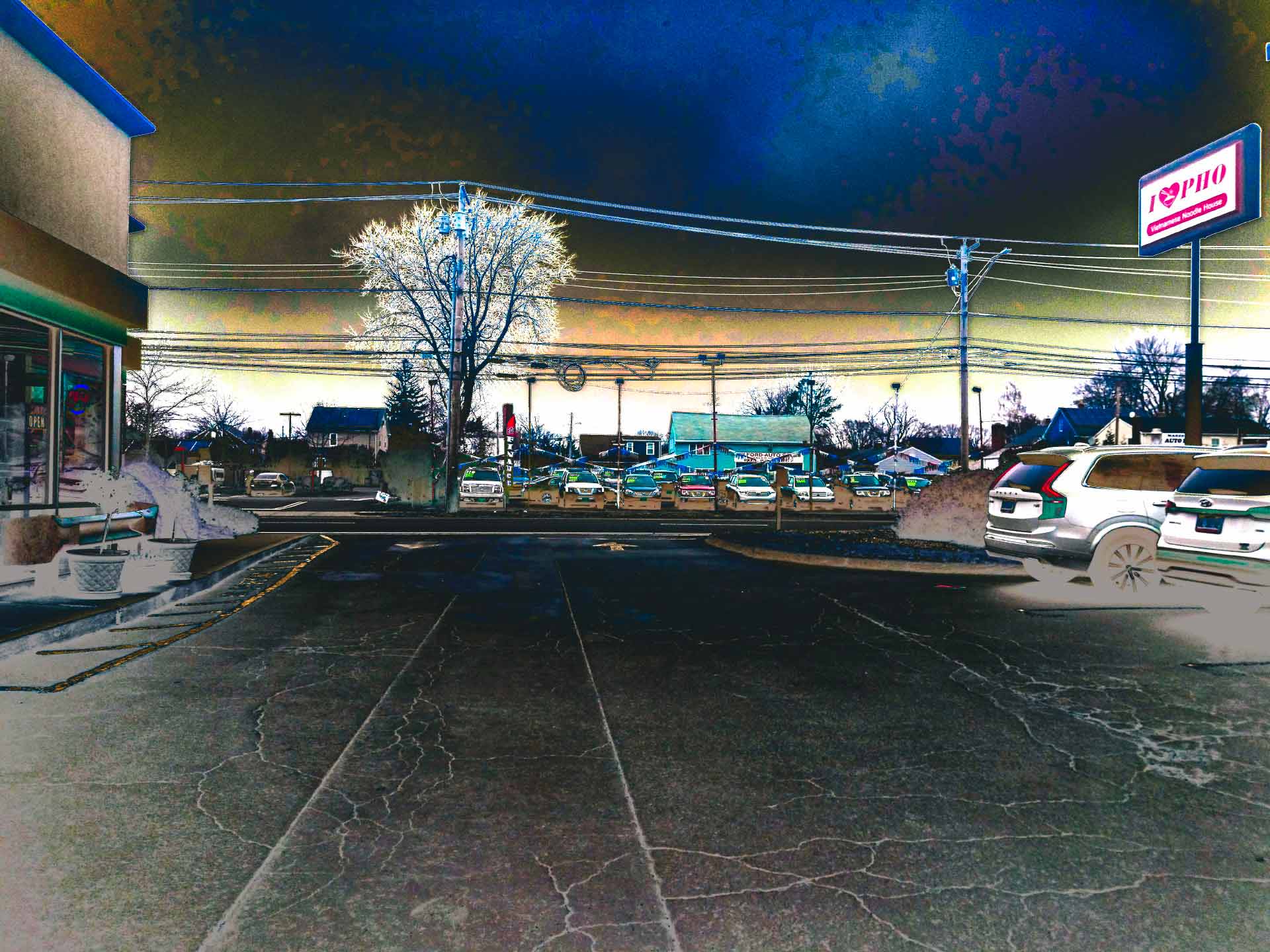 a photo showing a parking lot with inverted colors