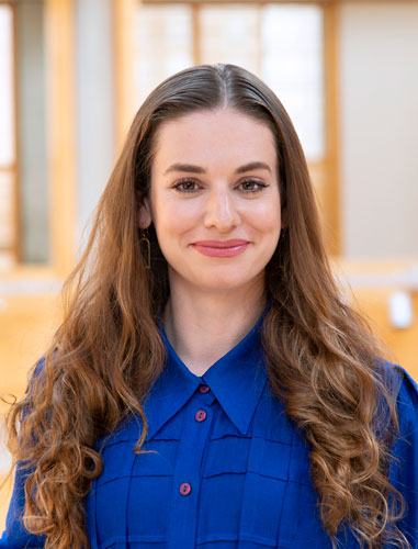 woman wearing a bright blue shirt