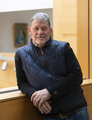 man wearing a quilted vest