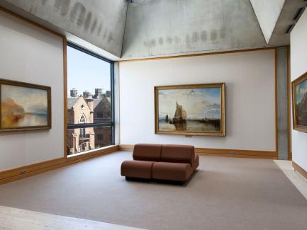 Three oil paintings by Turner on view in fourth floor galleries, view of Yale University Art Gallery through the window