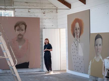 small woman in her studio