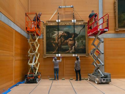 installing a large painting