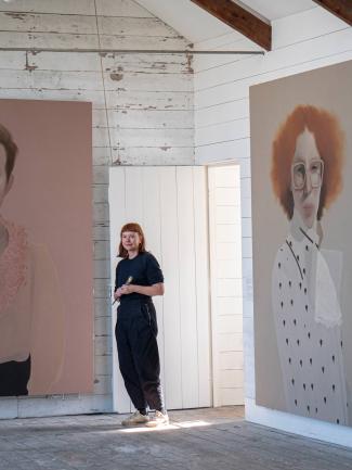 small woman in her studio