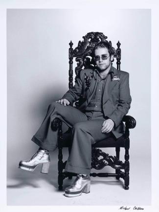 man seated in a chair
